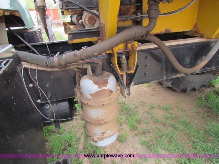 image for item B7211 Loral Magnum III center cab spreader truck