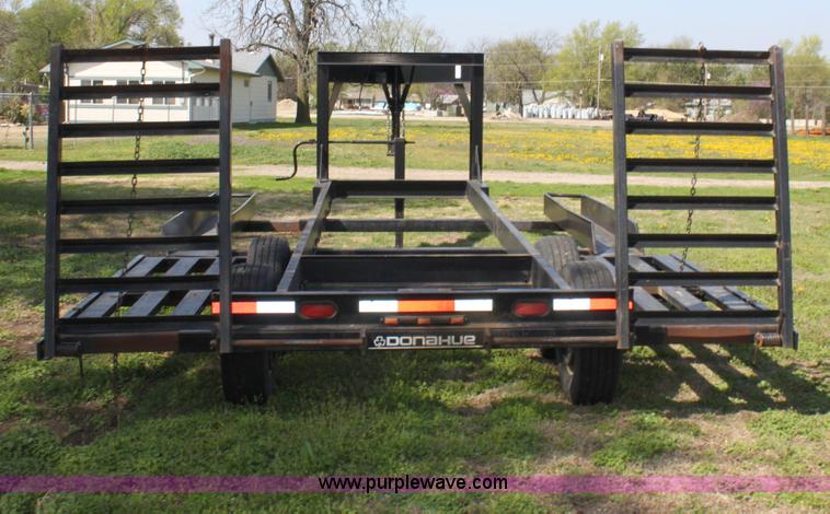image for item D7574 2003 Donahue EXG160 tandem axle swather trailer
