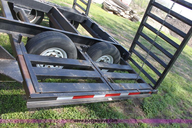 image for item D7574 2003 Donahue EXG160 tandem axle swather trailer