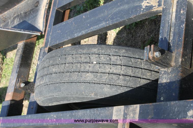 image for item D7574 2003 Donahue EXG160 tandem axle swather trailer