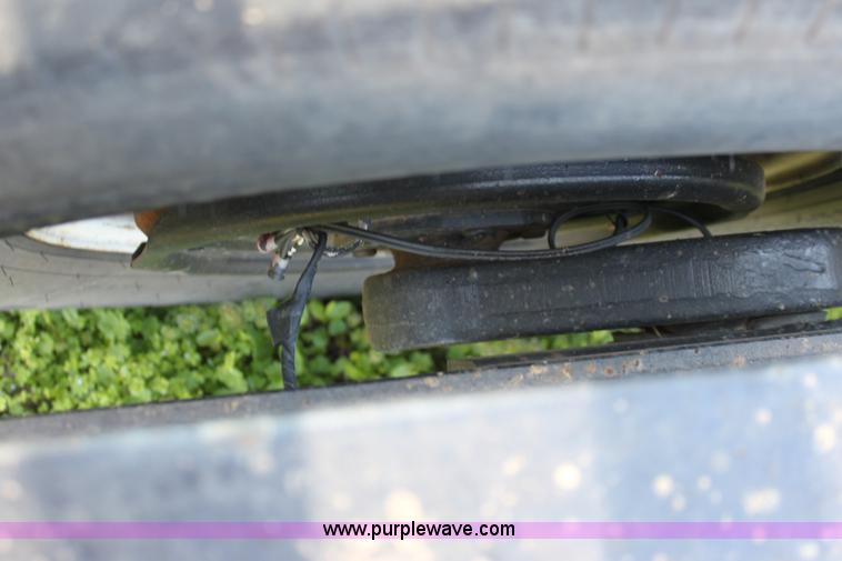 image for item D7574 2003 Donahue EXG160 tandem axle swather trailer