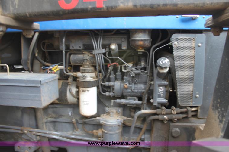 image for item D7674 New Holland 6610 tractor