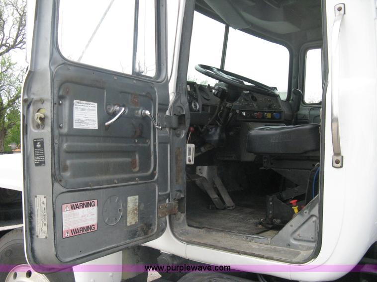 image for item A6153 1989 Mack R688ST tandem axle roll off truck