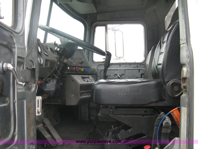 image for item A6153 1989 Mack R688ST tandem axle roll off truck