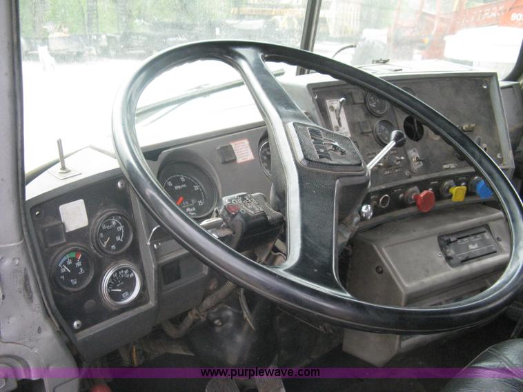 image for item A6153 1989 Mack R688ST tandem axle roll off truck