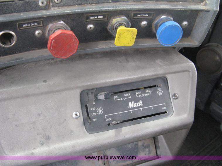 image for item A6153 1989 Mack R688ST tandem axle roll off truck