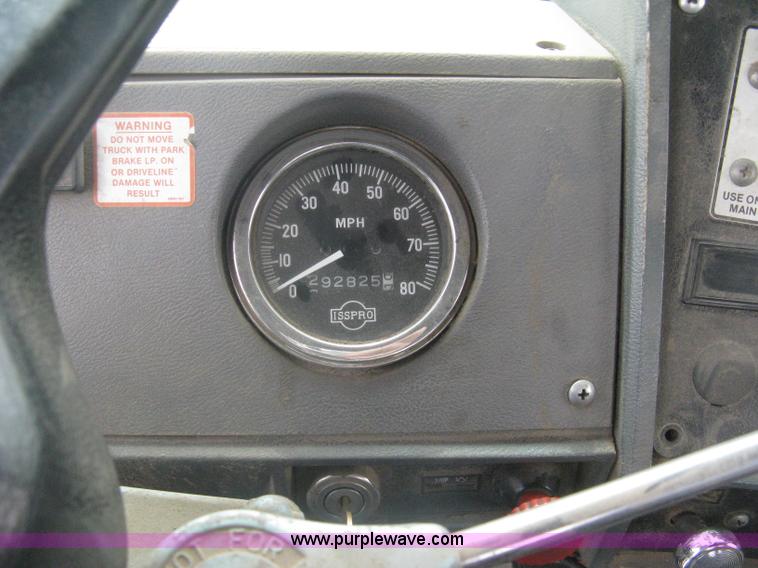 image for item A6153 1989 Mack R688ST tandem axle roll off truck