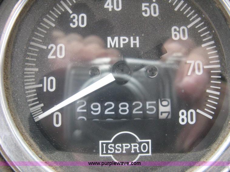 image for item A6153 1989 Mack R688ST tandem axle roll off truck