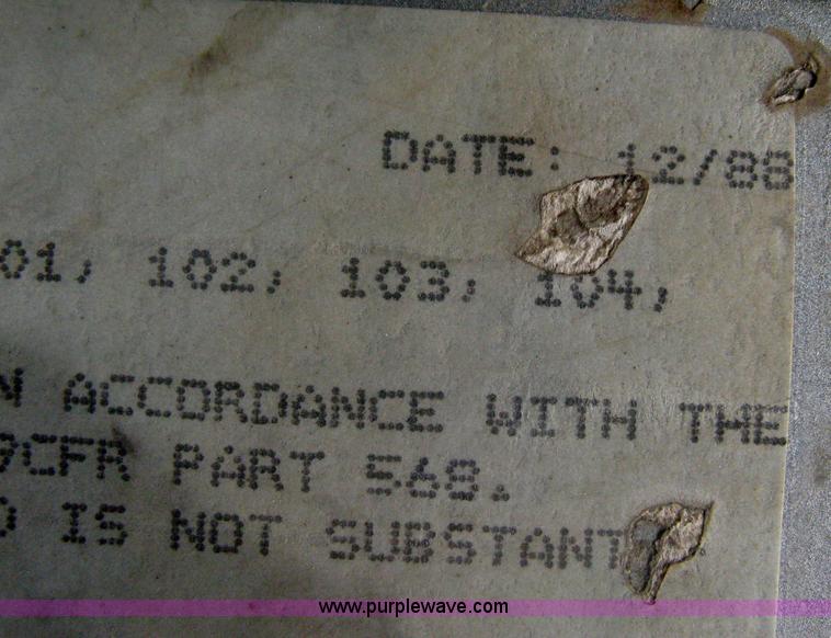 image for item A6153 1989 Mack R688ST tandem axle roll off truck