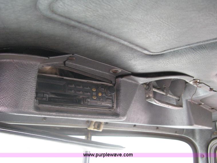 image for item A6153 1989 Mack R688ST tandem axle roll off truck