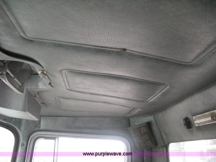 image for item A6153 1989 Mack R688ST tandem axle roll off truck