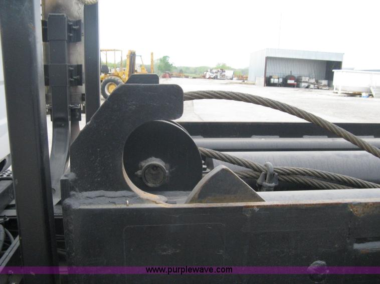 image for item A6153 1989 Mack R688ST tandem axle roll off truck