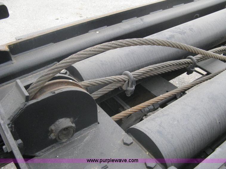 image for item A6153 1989 Mack R688ST tandem axle roll off truck