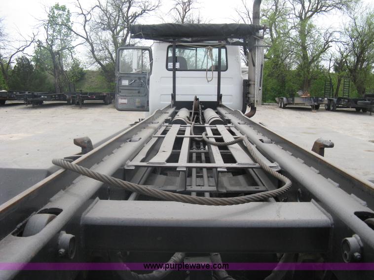 image for item A6153 1989 Mack R688ST tandem axle roll off truck