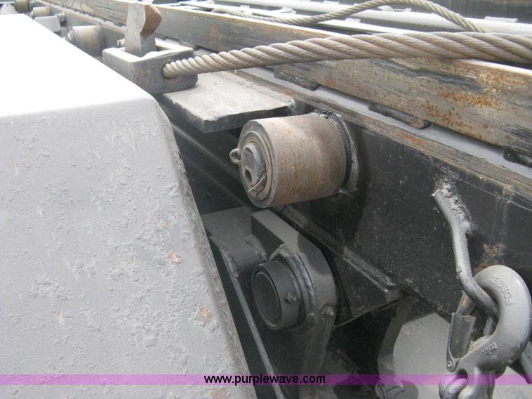 image for item A6153 1989 Mack R688ST tandem axle roll off truck