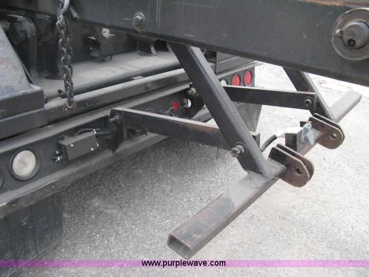 image for item A6153 1989 Mack R688ST tandem axle roll off truck