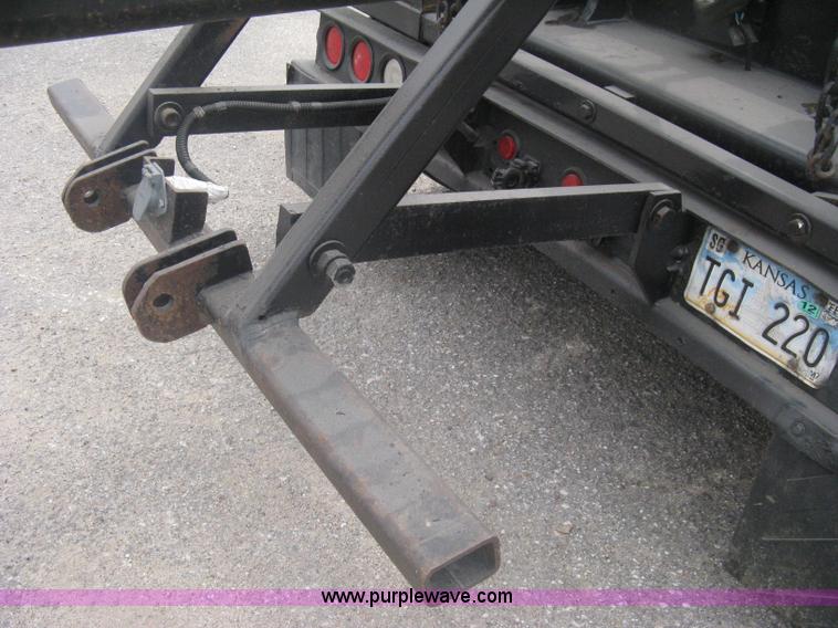 image for item A6153 1989 Mack R688ST tandem axle roll off truck
