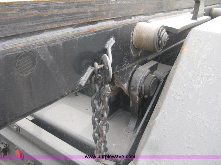 image for item A6153 1989 Mack R688ST tandem axle roll off truck