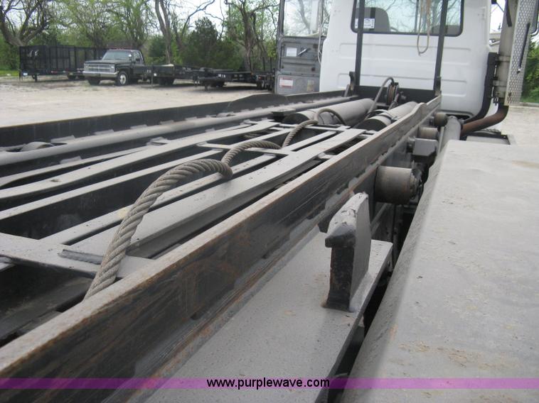 image for item A6153 1989 Mack R688ST tandem axle roll off truck