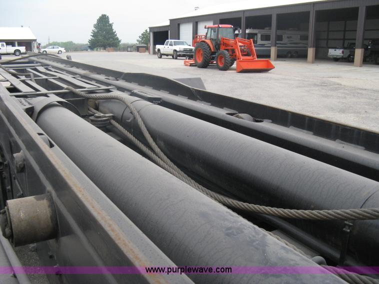 image for item A6153 1989 Mack R688ST tandem axle roll off truck