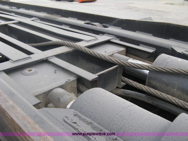 image for item A6153 1989 Mack R688ST tandem axle roll off truck