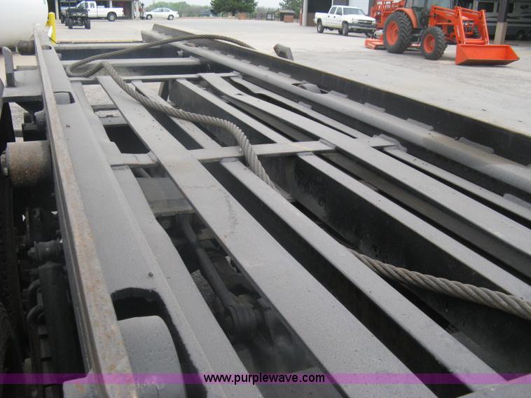 image for item A6153 1989 Mack R688ST tandem axle roll off truck