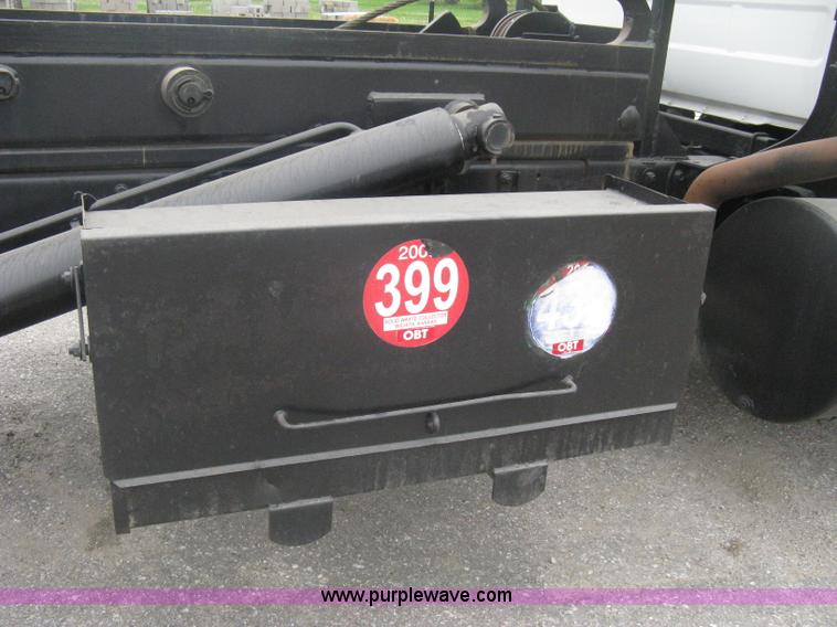 image for item A6153 1989 Mack R688ST tandem axle roll off truck