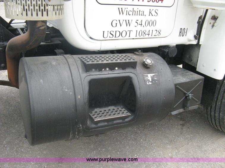 image for item A6153 1989 Mack R688ST tandem axle roll off truck
