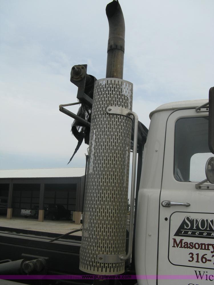 image for item A6153 1989 Mack R688ST tandem axle roll off truck