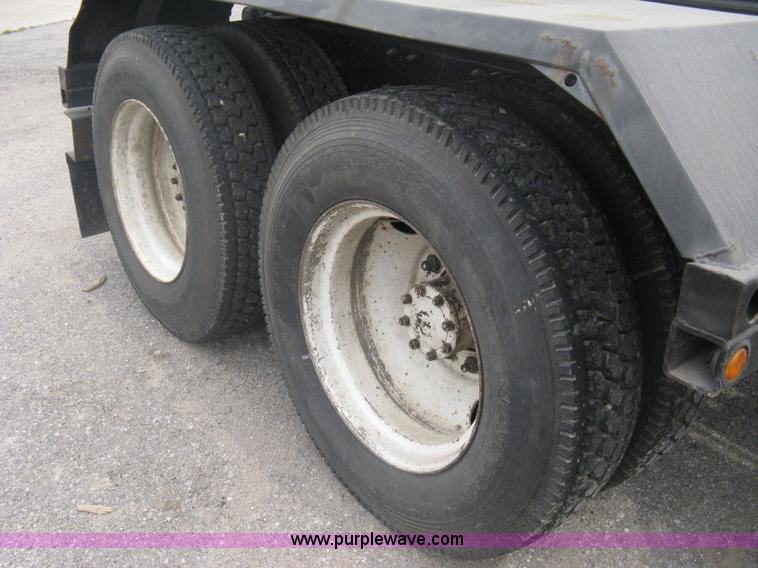 image for item A6153 1989 Mack R688ST tandem axle roll off truck