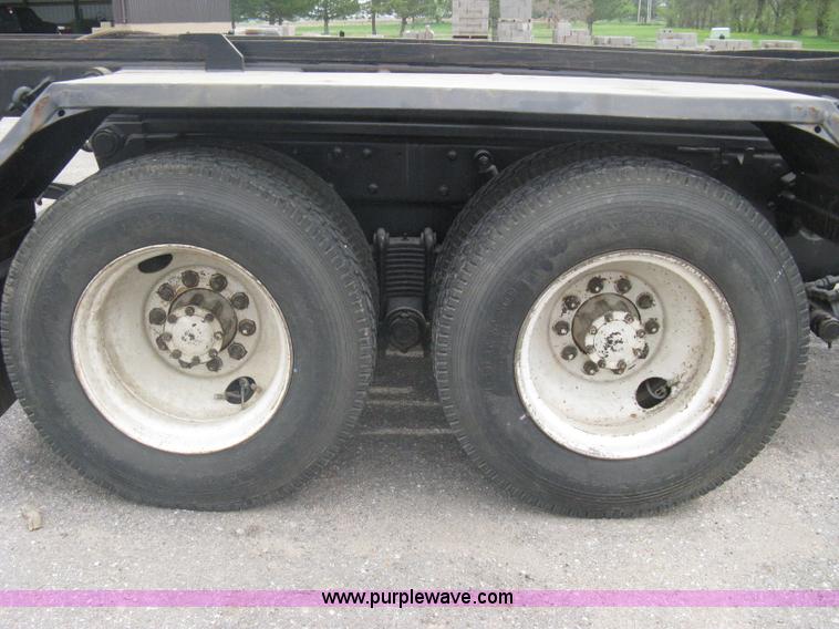 image for item A6153 1989 Mack R688ST tandem axle roll off truck