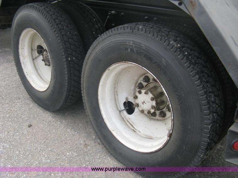 image for item A6153 1989 Mack R688ST tandem axle roll off truck