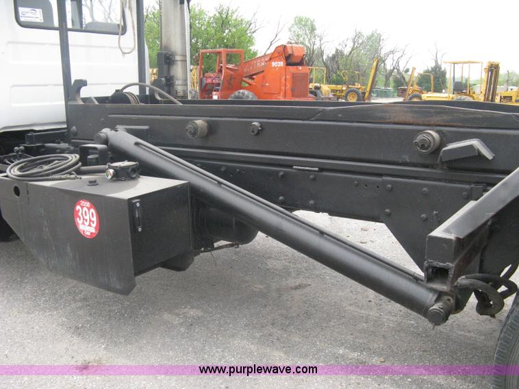 image for item A6153 1989 Mack R688ST tandem axle roll off truck