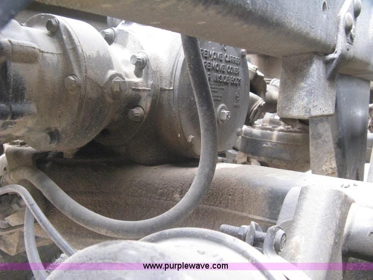 image for item A6153 1989 Mack R688ST tandem axle roll off truck