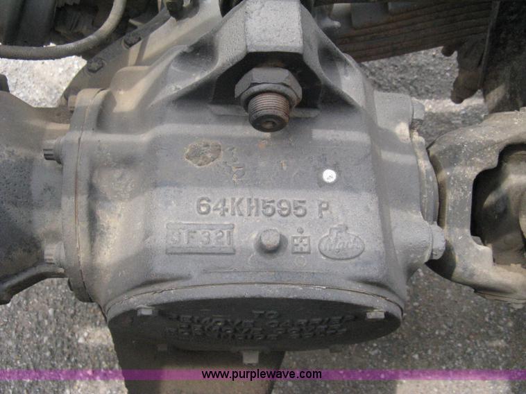 image for item A6153 1989 Mack R688ST tandem axle roll off truck