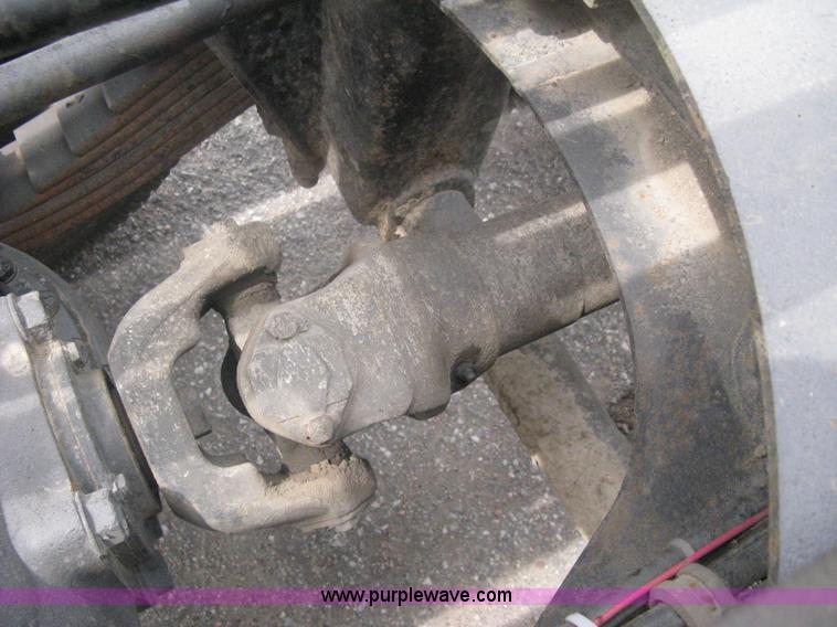 image for item A6153 1989 Mack R688ST tandem axle roll off truck