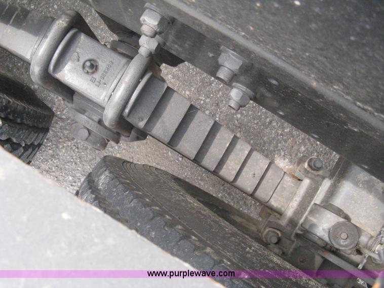 image for item A6153 1989 Mack R688ST tandem axle roll off truck