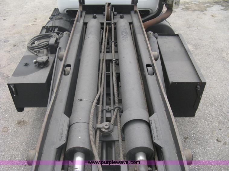 image for item A6153 1989 Mack R688ST tandem axle roll off truck