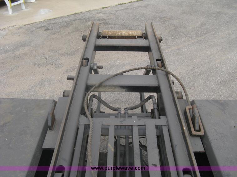 image for item A6153 1989 Mack R688ST tandem axle roll off truck