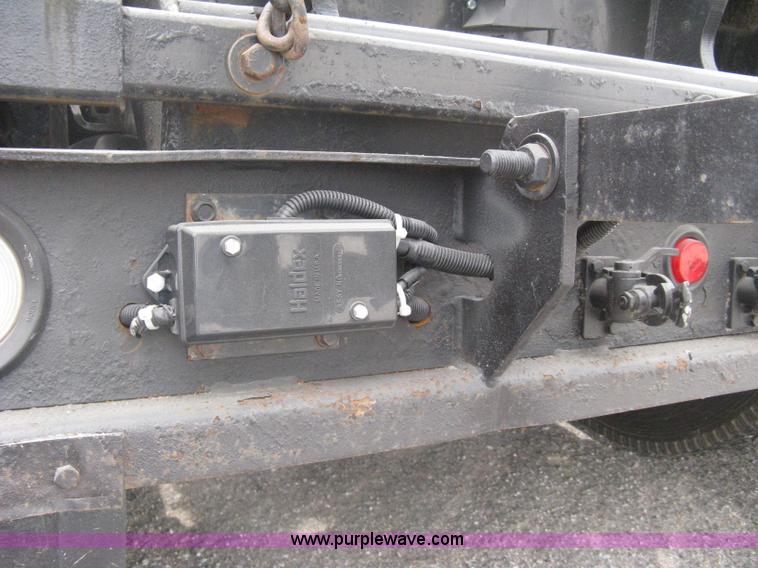 image for item A6153 1989 Mack R688ST tandem axle roll off truck