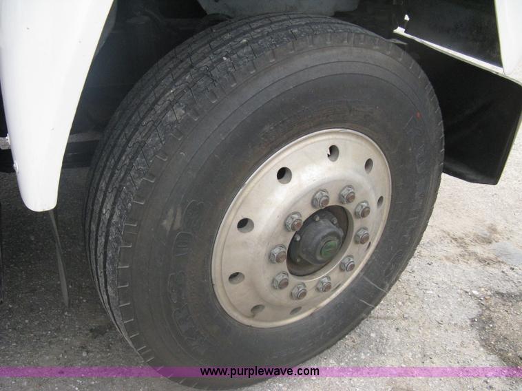 image for item A6153 1989 Mack R688ST tandem axle roll off truck