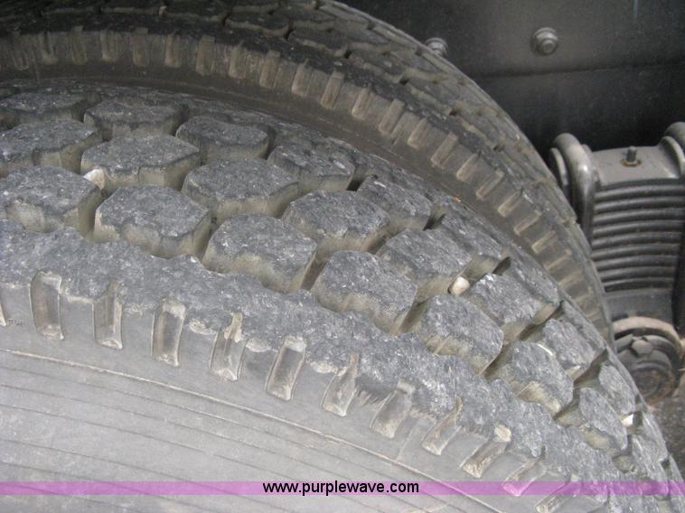 image for item A6153 1989 Mack R688ST tandem axle roll off truck