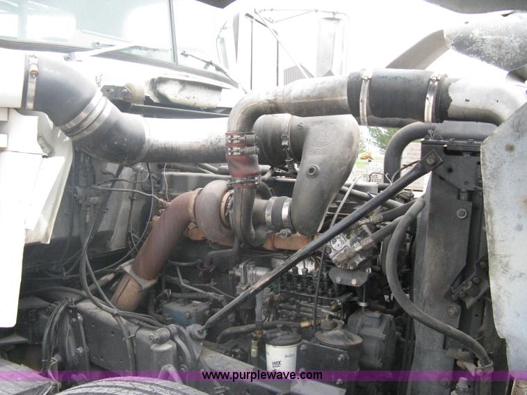 image for item A6153 1989 Mack R688ST tandem axle roll off truck