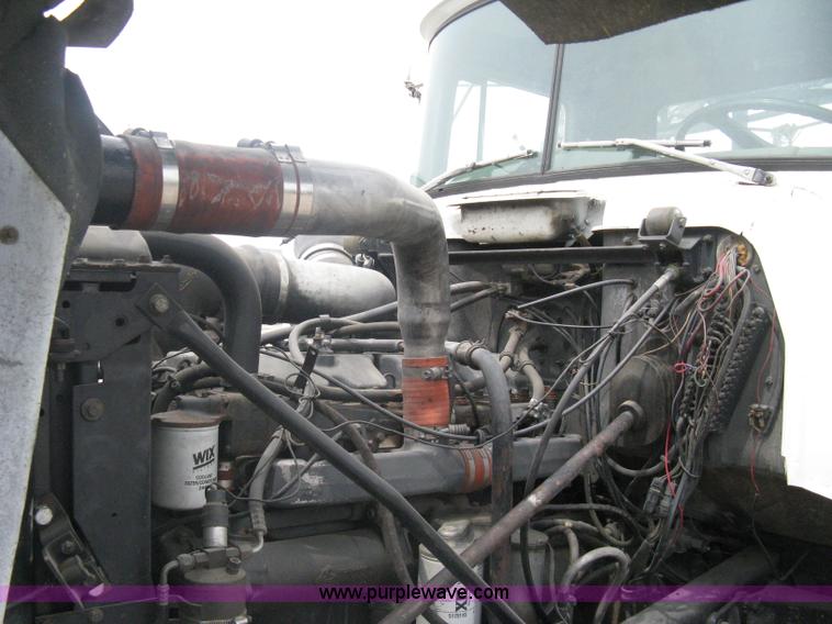 image for item A6153 1989 Mack R688ST tandem axle roll off truck