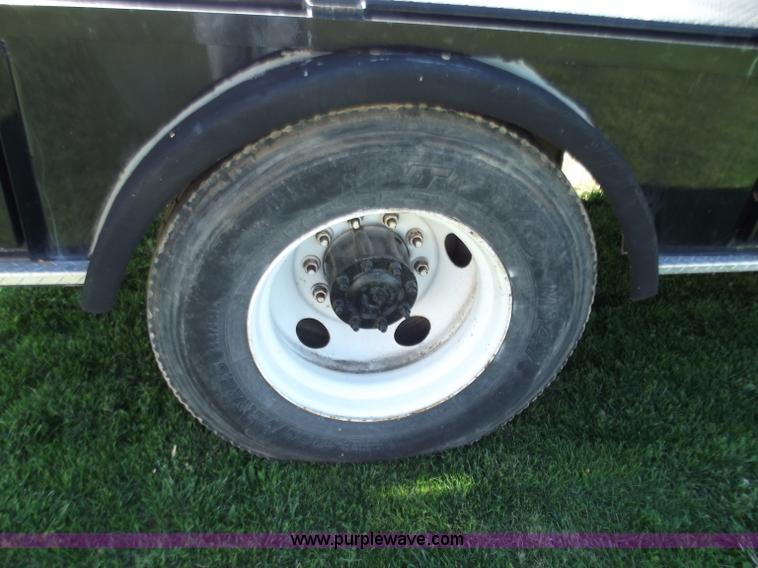 image for item B9194 2006 Freightliner M2 106 flatbed truck