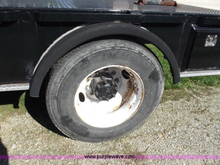 image for item B9194 2006 Freightliner M2 106 flatbed truck