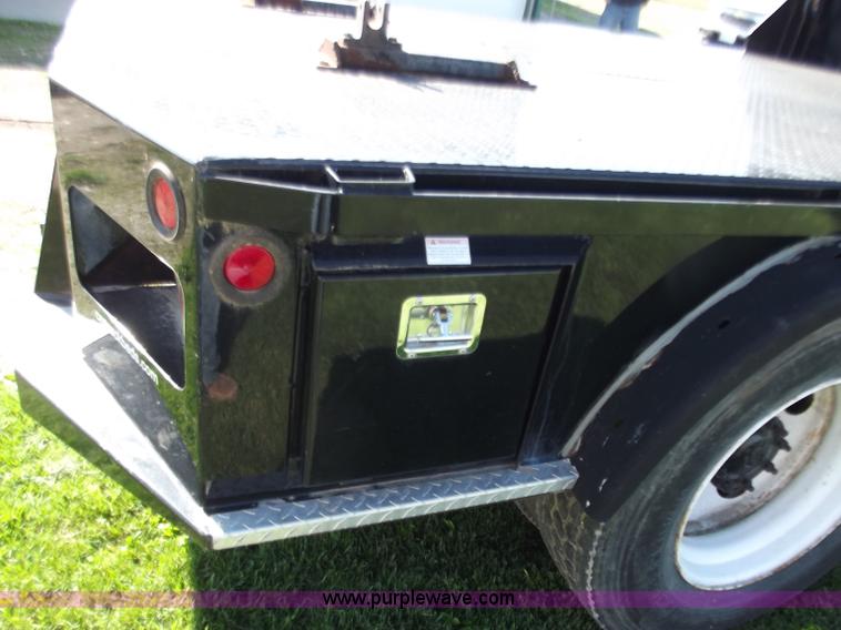 image for item B9194 2006 Freightliner M2 106 flatbed truck