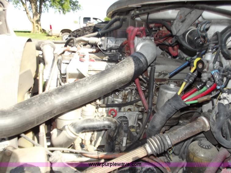 image for item B9194 2006 Freightliner M2 106 flatbed truck