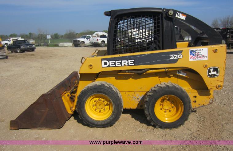 image for item C5418 2005 John Deere 320 skid steer