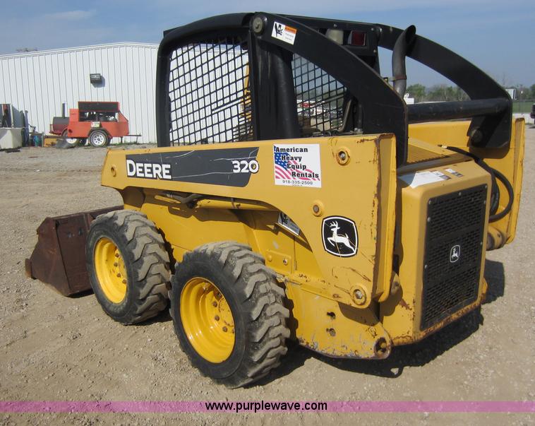 image for item C5418 2005 John Deere 320 skid steer